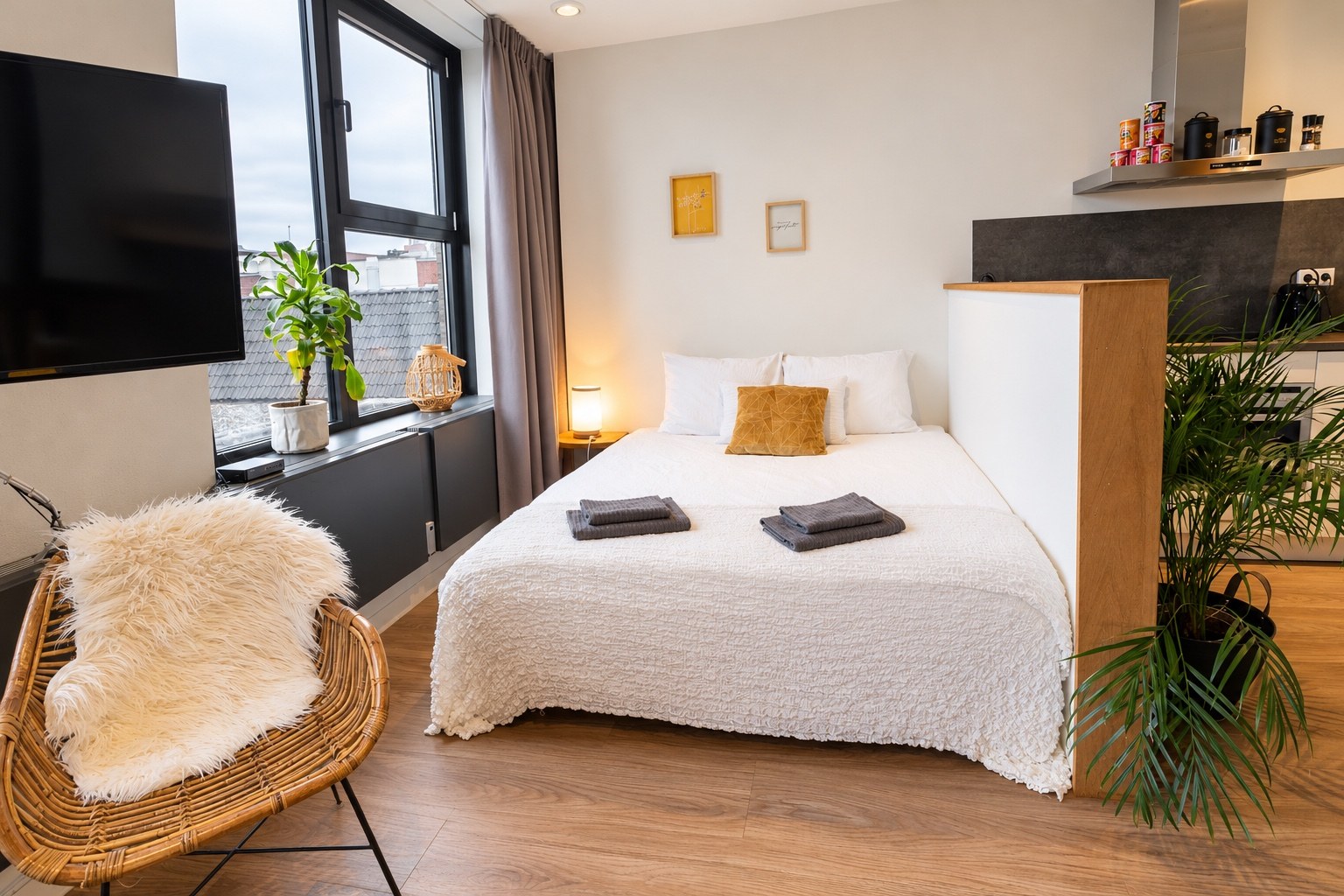 Een verzorgd bed in Stadslogies appartement V in Leeuwarden